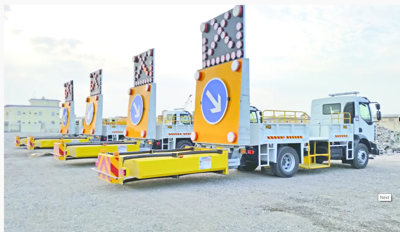 Fleet of EMI TMA crash cushion trucks with arrow boards lined up for road safety deployment across UAE